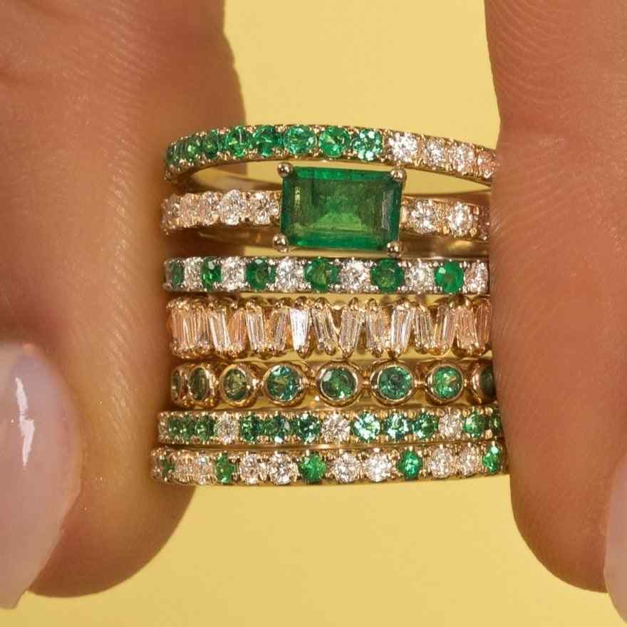 14k gold shared prong emerald eternity diamond band