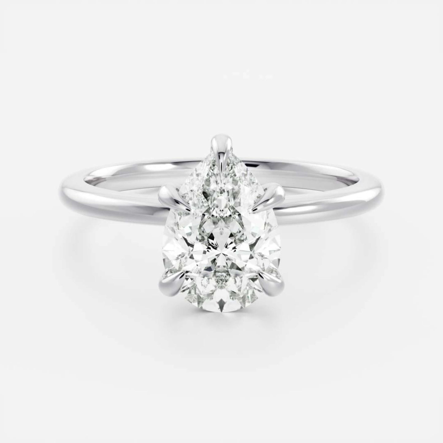 14k White Gold Pear Cut Diamond Basket Style Ring