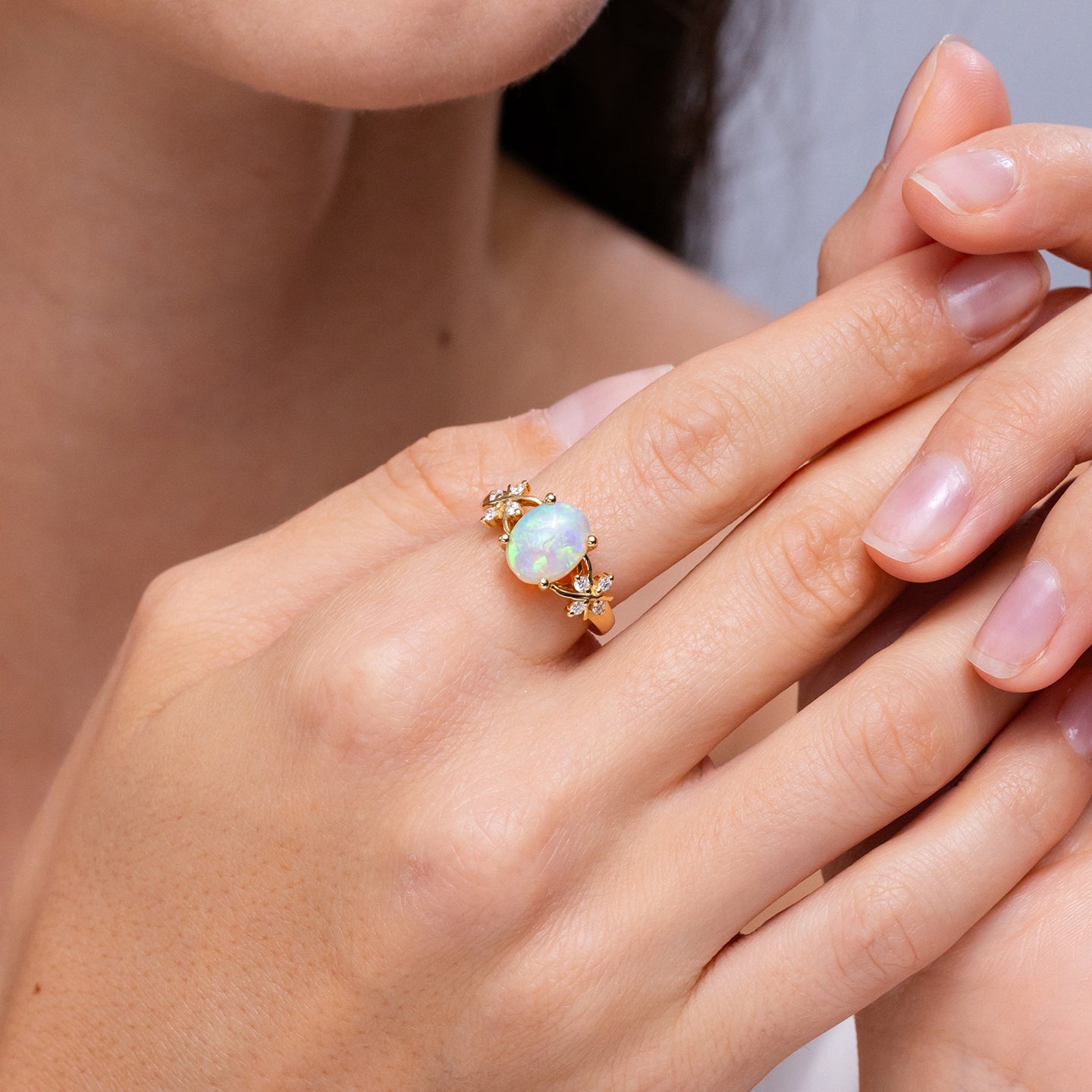 Oval Opal & Side Diamond Engagement rings