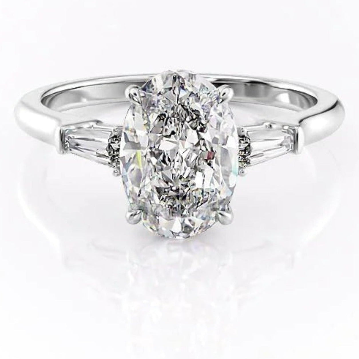 Oval And Tapered Baguette Diamond Ring