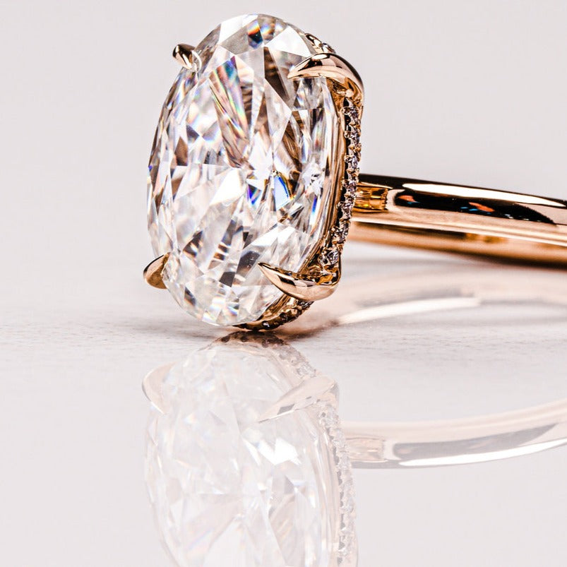 Oval Cut Lab Grown Diamond Hidden Halo Solitaire Engagement Ring