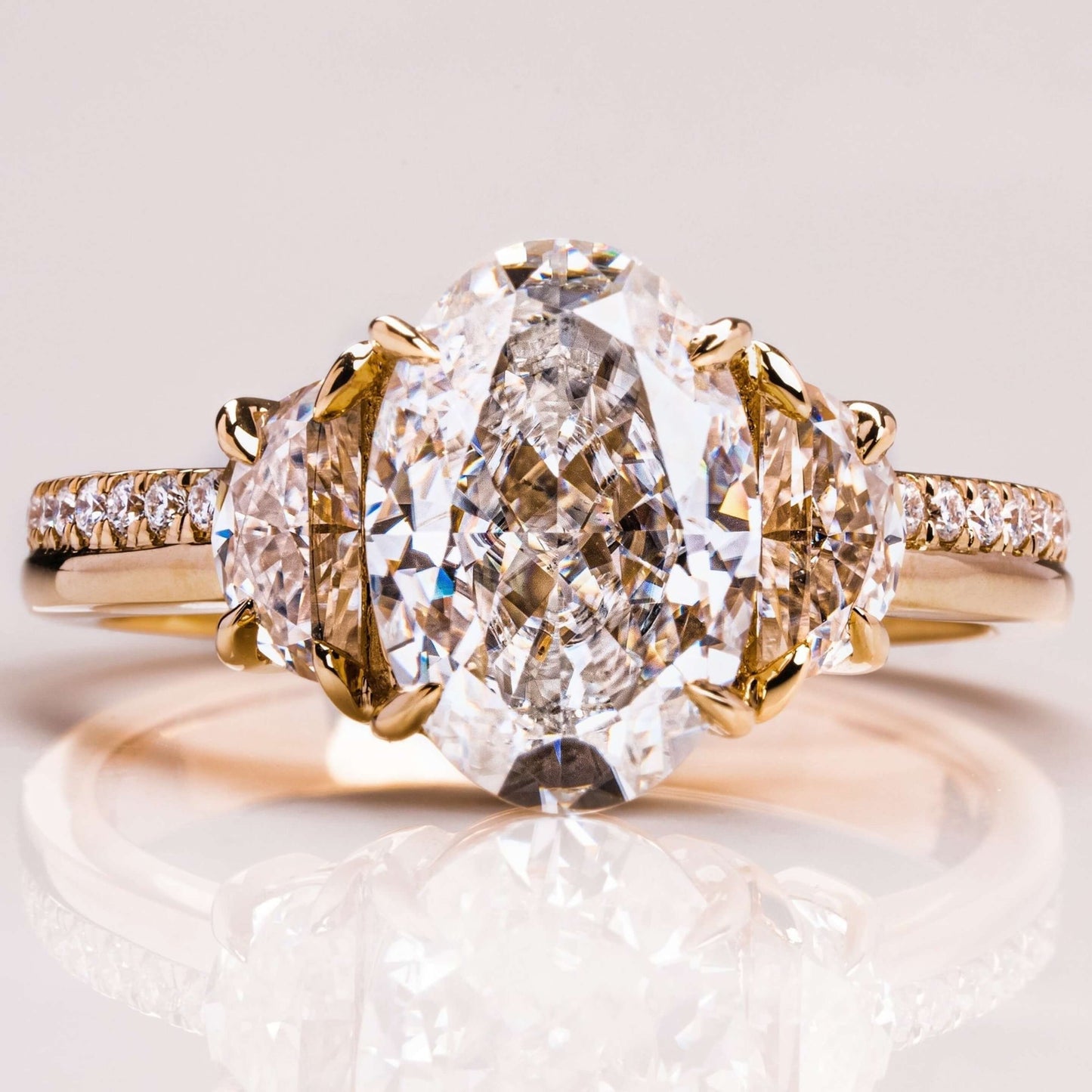 Oval Cut With Half Moon Three Diamond Ring In 18k Gold