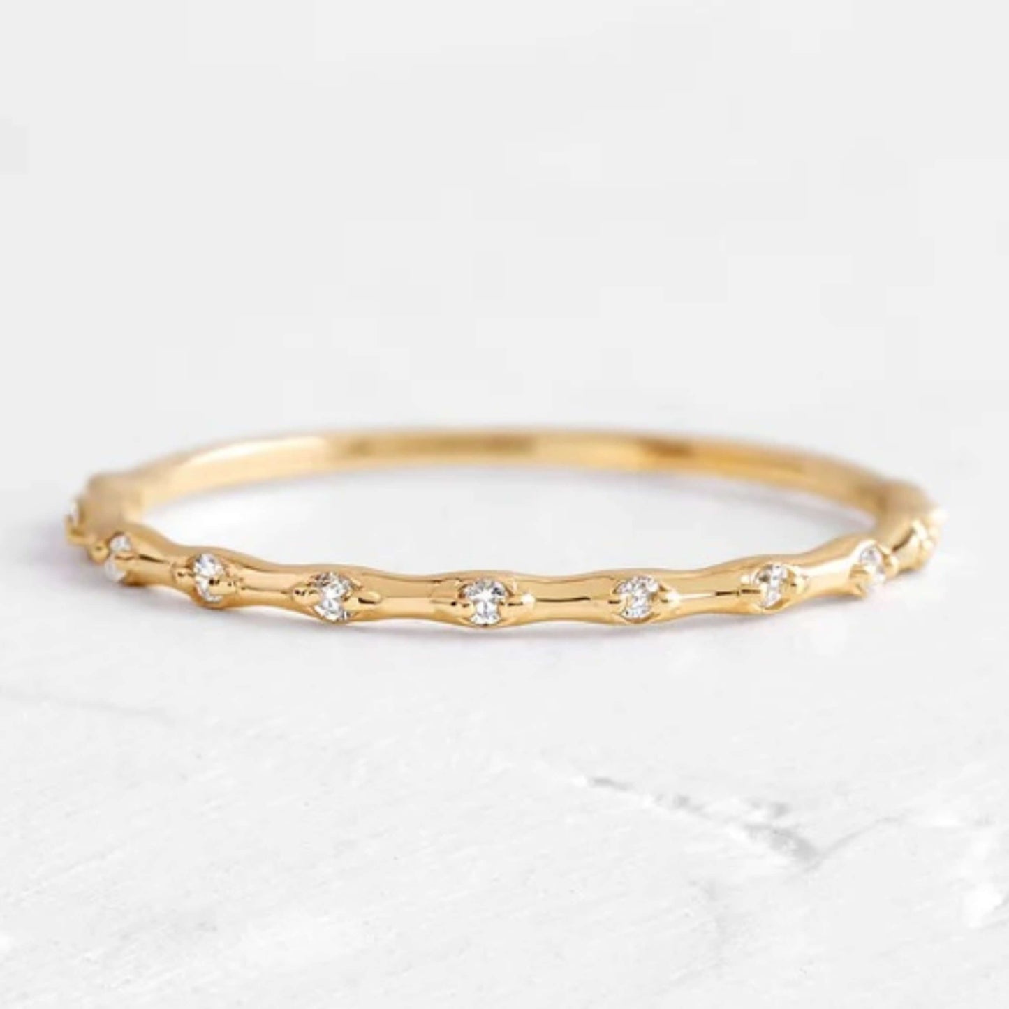 Round Cut Distance Diamond Band