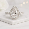 Pear Cut Halo Moissanite Ring in 10K Gold