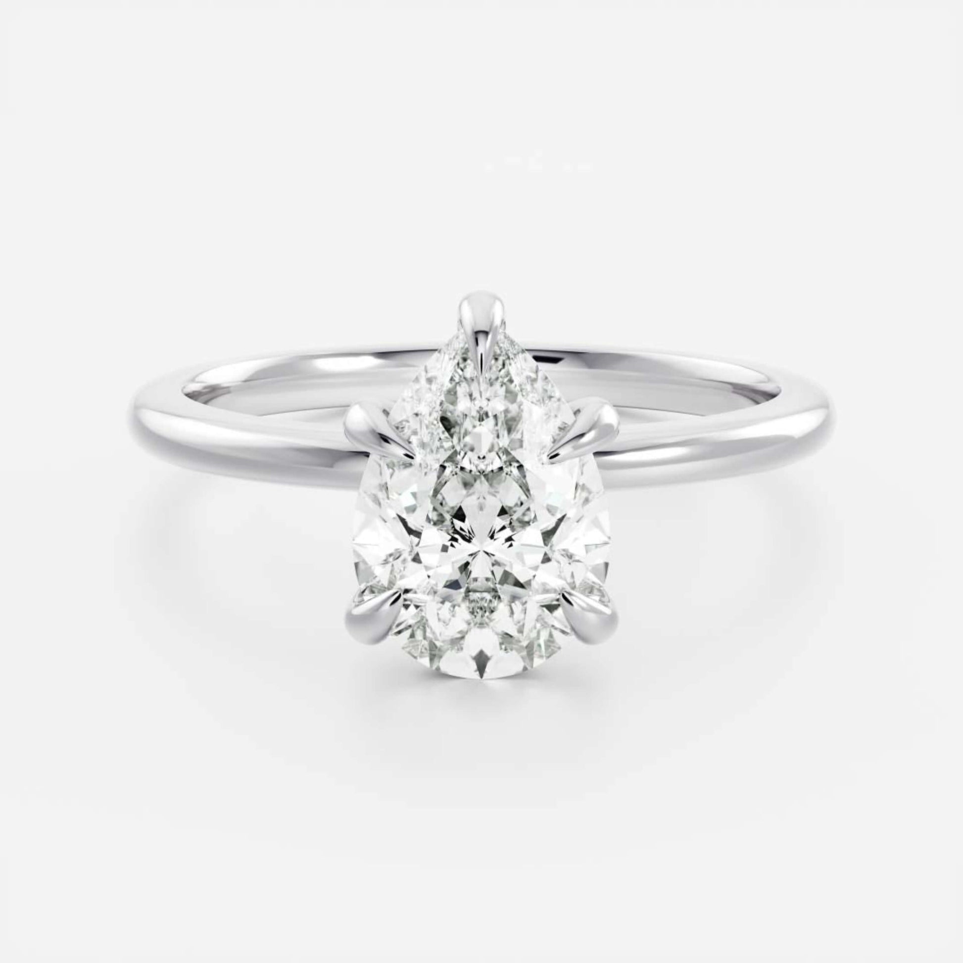 14k White Gold Pear Cut Diamond Basket Style Ring