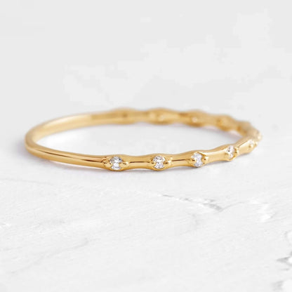 18k Brilliant Round Cut Distance Diamond Band
