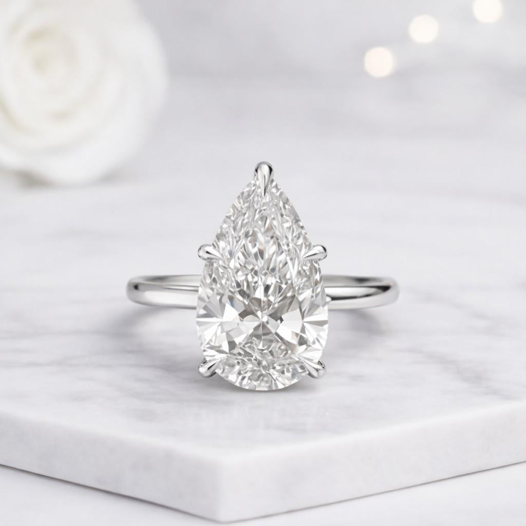 5 prong pear shaped solitaire ring