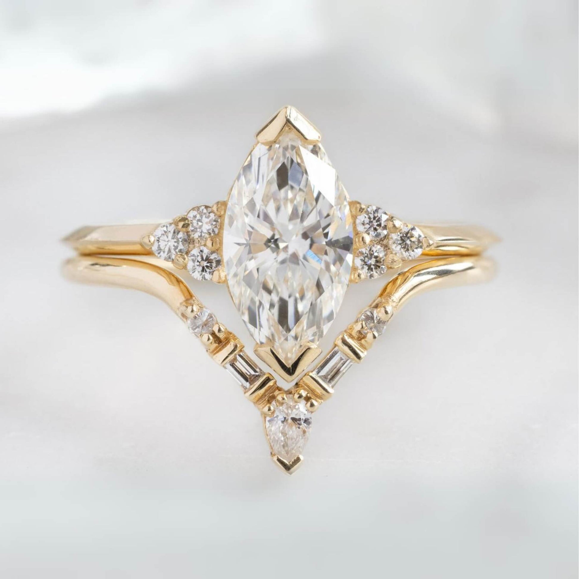 Delicate Marquise cut Moissanite engagement ring