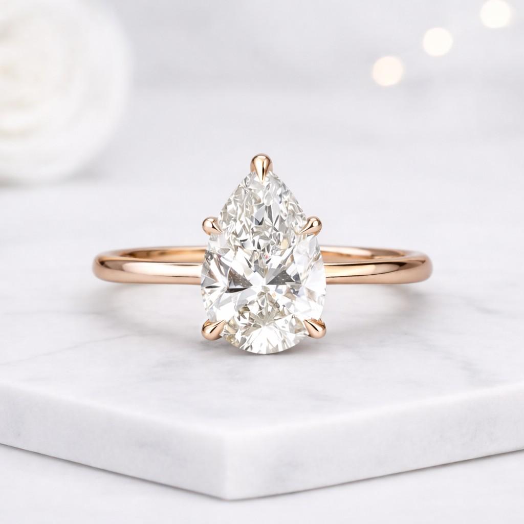 gold pear solitaire ring pear engagement ring