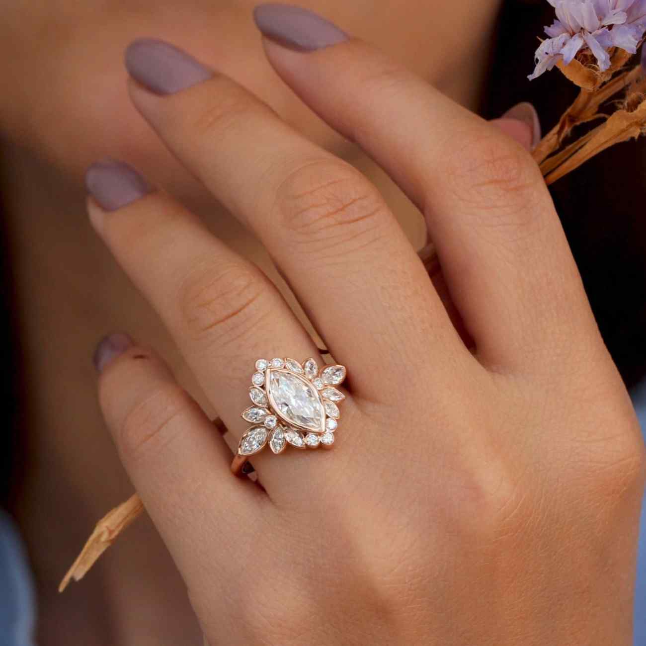 marquise cut moissanite bezel set art deco engagement_ring