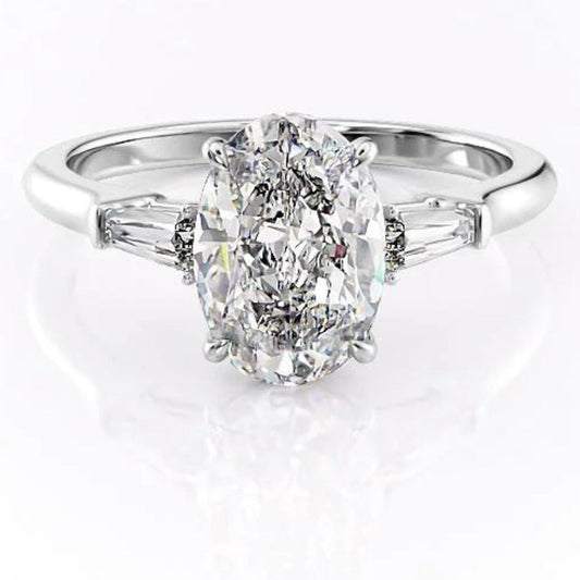 Oval And Tapered Baguette Diamond Ring