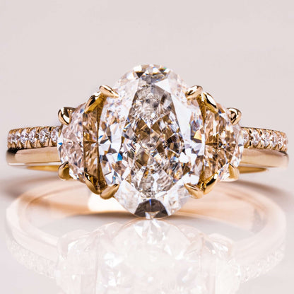 Oval Cut With Half Moon Three Diamond Ring In 18k Gold