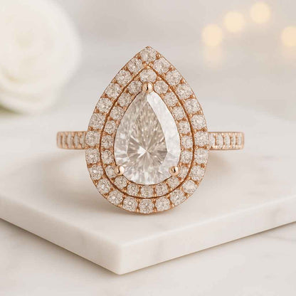 Pear Cut Blue Sapphire Halo Engagement Ring with Double Row Pave Setting