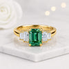 Emerald Cut Green Gemstone Three Stone Ring in Yellow Gold