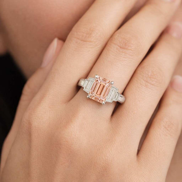 baguette side stones tapered baguette ring center stone ring peach gemstone ring blush stone ring rectangular stone ring prong setting ring comfort fit ring polished band ring yellow band ring unique ring