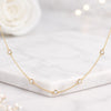 Round Lab Grown Diamond Station Bezel Set Necklace In 14K Yellow Gold