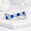 Blue Sapphire Round Cut Gemstone Twist Ring