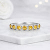 Round Cut Fancy Yellow Diamond Bezel Set Eternity Ring