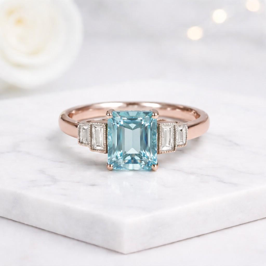 classic engagement ring handcrafted ring artisan jewelry fine ring blue gem jewelry statement jewelry unique engagement ring proposal ring women jewelry ring design luxury gift gemstone accessory polished jewelry prong set ring rectangular cut ring sparkling gemstone delicate ring