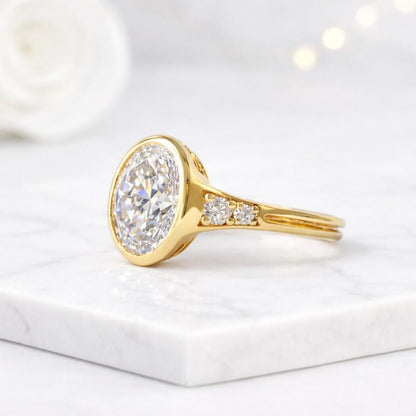 elongated shape ring oval bezel design oval centerpiece ring round brilliant ring marquise diamond ring