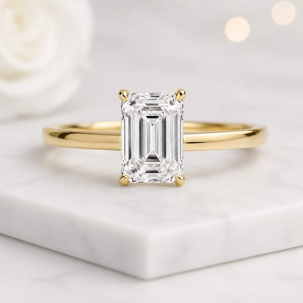 emerald cut ring solitaire ring engagement ring gold ring promise ring bridal ring fine jewelry luxury ring elegant ring classic ring modern ring