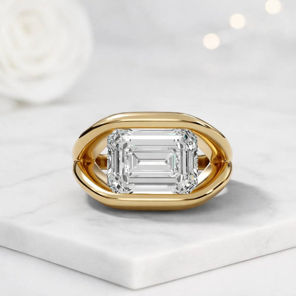 emerald cut ring solitaire ring gold ring statement ring modern ring chunky ring bold ring wide band ring open band ring bypass ring geometric ring sculptural ring luxury ring fine jewelry women ring fashion ring elegant ring polished ring sleek ring
