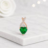 Heart Cut Emerald and Diamond Pendant in Yellow Gold