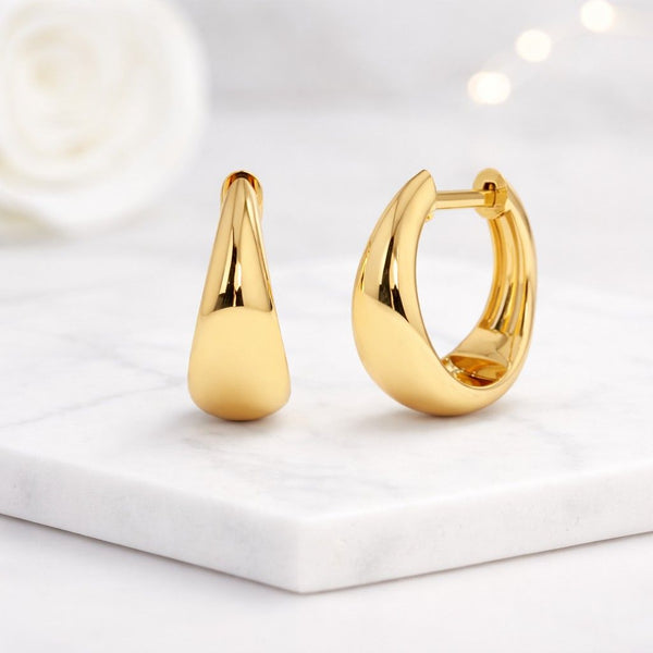 gold hoop earrings chunky hoops puffy earrings statement hoops thick hoop earrings modern hoops minimalist hoops bold earrings polished earrings shiny earrings smooth earrings curved earrings