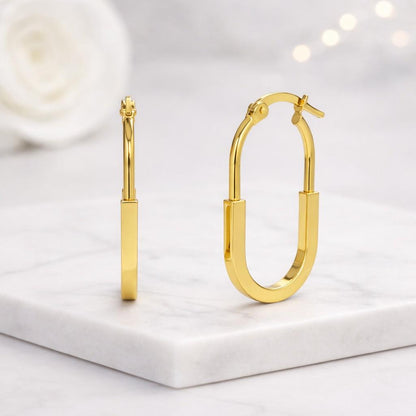 gold hoop earrings oval hoop earrings rectangle hoop earrings elongated hoop earrings geometric hoop earrings modern hoop earrings minimalist earrings sleek hoop earrings polished earrings