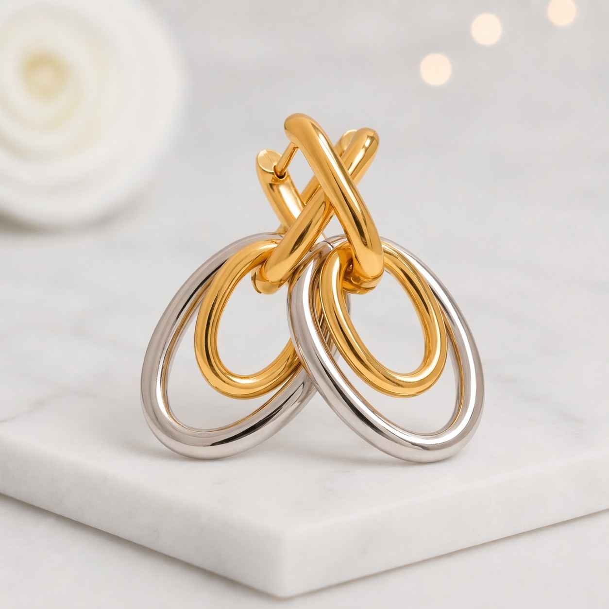 hoop earrings dangle earrings link earrings oval earrings double hoop earrings two tone earrings gold silver earrings drop earrings women earrings fashion earrings everyday earrings modern earrings simple earrings classic earrings polished earrings shiny earrings statement earrings