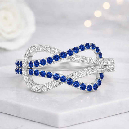 infinity ring blue stone ring sapphire ring crossover ring twist ring openwork ring statement ring women ring crystal ring silver ring loop ring figure eight ring elegant ring fashion ring gemstone ring anniversary ring