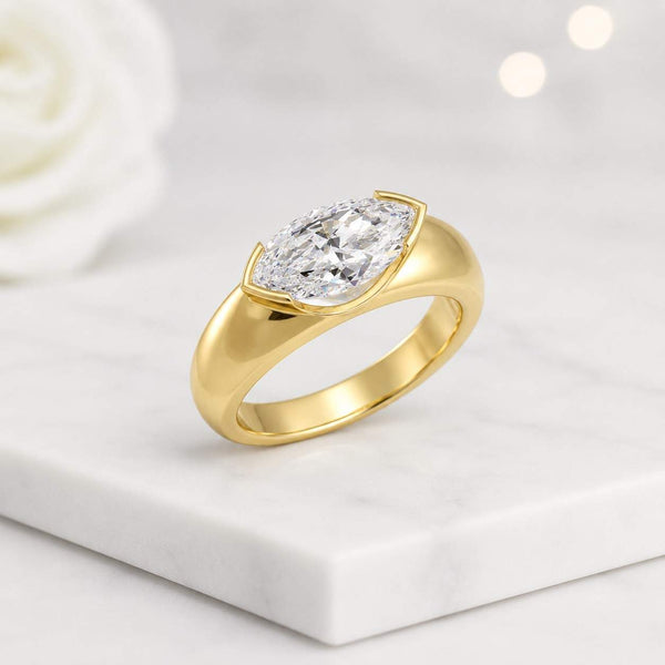 marquise ring solitaire ring gold ring engagement ring statement ring wide band ring bezel ring bezel set ring marquise cut ring polished ring shiny ring luxury ring fine jewelry women ring promise ring bridal ring elegant ring classic ring sleek ring