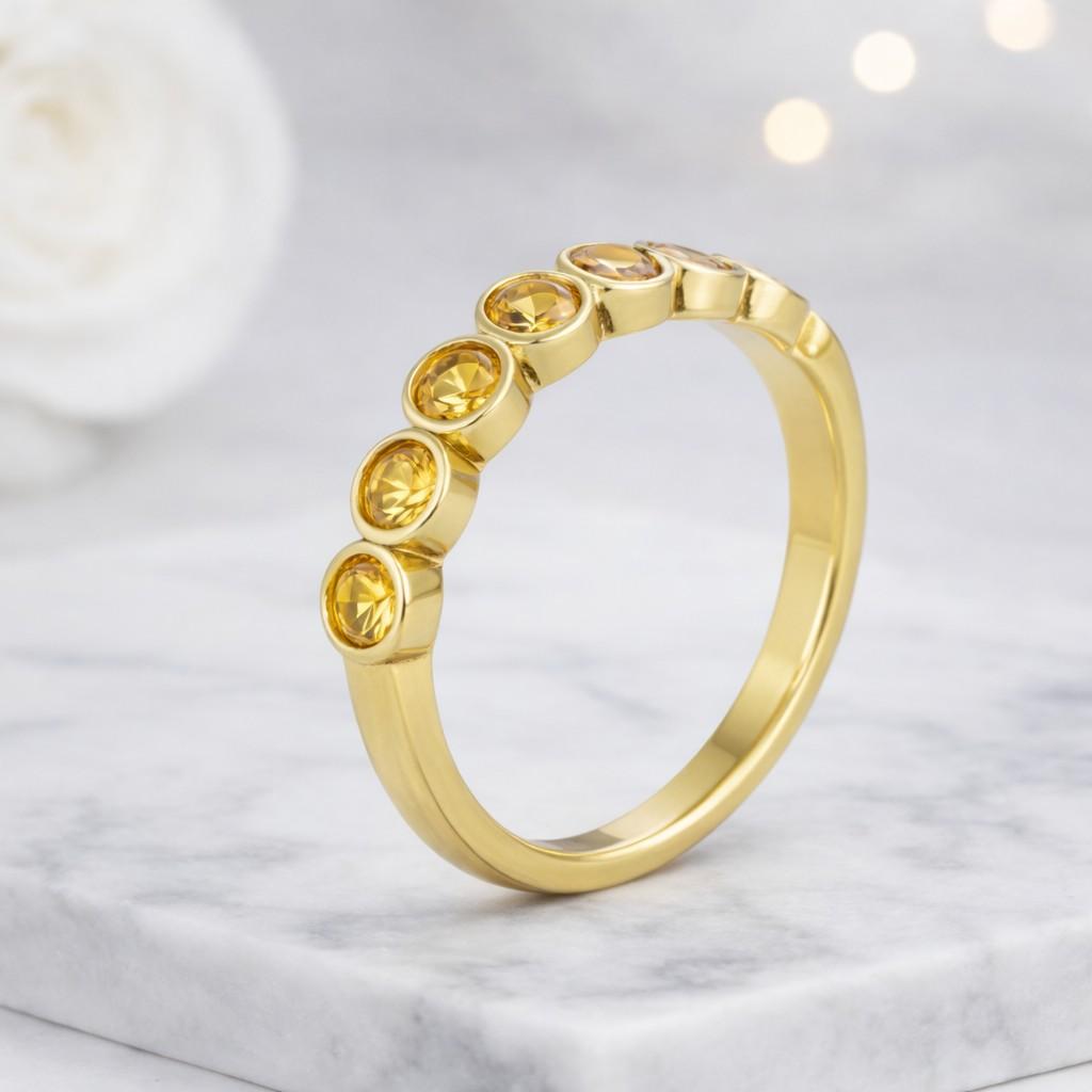 modern ring gold band yellow gem ring birthstone ring september stone ring half eternity ring full eternity look bezel set ring polished ring