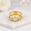 Round Cut Opal Three Stone Bezel Ring In 14K Gold