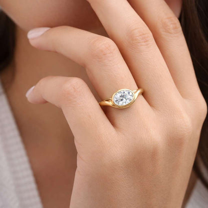 oval cut ring bezel set ring yellow gold ring engagement jewelry solitaire jewelry bridal jewelry fine ring luxury jewelry modern jewelry simple jewelry dainty jewelry minimalist ring
