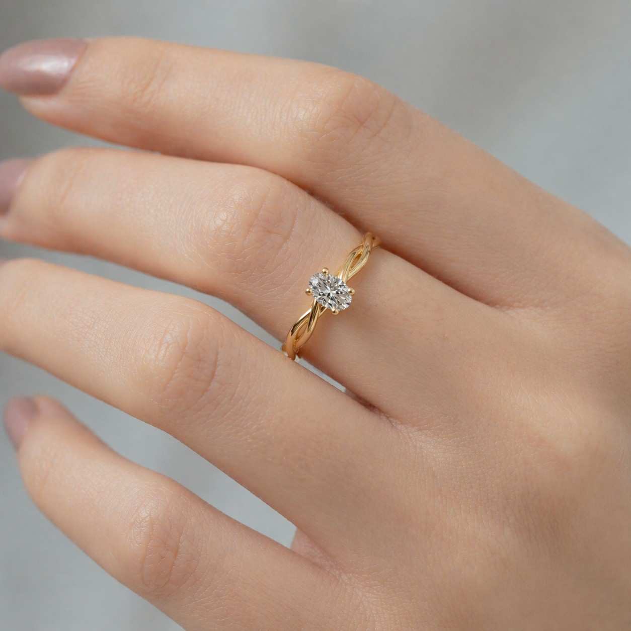 oval engagement ring gold engagement ring solitaire engagement ring twist engagement ring braided engagement ring oval cut ring elegant engagement ring modern engagement ring