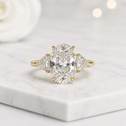 oval engagement ring three stone ring oval cut ring trillion side stone lab grown ring statement ring