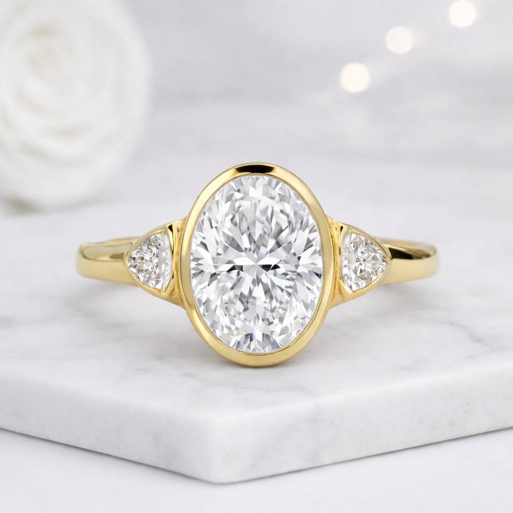 oval ring bezel ring engagement ring solitaire ring three stone ring side stone ring gold ring promise ring bridal ring fine jewelry oval center polished band