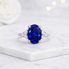 Oval Cut Sapphire & Round Side Diamond Engagement Ring