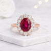 Oval Ruby Halo Engagement Ring with Round Diamond Accent Halo