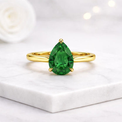 pear solitaire teardrop stone green gemstone gold band ring jewelry accessory elegant jewelry bridal jewelry fine ring minimalist ring