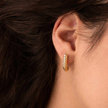 pierced earrings post back earrings secure back earrings smooth earrings braided hoops spiral earrings twist design earrings rounded hoops tube earrings glossy earrings