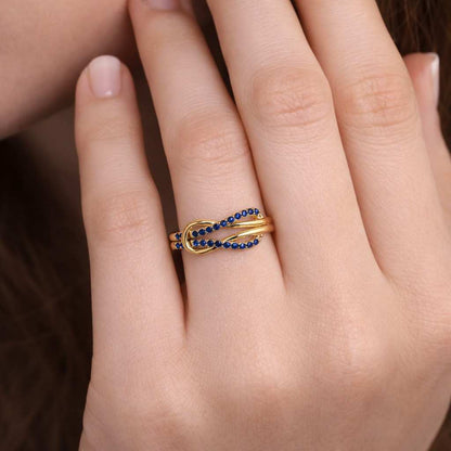 polished ring sleek ring eye catching ring everyday ring comfort fit ring wedding band ring anniversary ring bridal ring modern ring stylish ring feminine ring delicate ring luxury ring sparkling ring blue crystal ring infinity band ring knot band ring swirl ring crossover band ring silver jewelry ring
