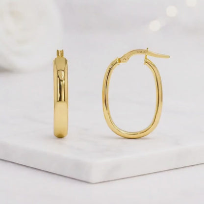 oval gold hoops yellow gold hoops sleek earrings clean design hoops rounded hoops tube hoops bold hoops casual earrings