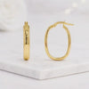 oval gold hoops yellow gold hoops sleek earrings clean design hoops rounded hoops tube hoops bold hoops casual earrings