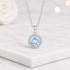 Round Blue Topaz Halo Pendant Necklace