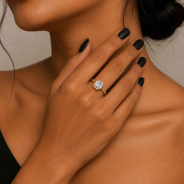 round solitaire ring bezel set ring floating ring low profile ring comfort band sleek ring polished ring glossy finish classic jewelry fine ring everyday jewelry bridal accessory wedding jewelry engagement jewelry simple jewelry elegant jewelry
