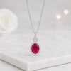 Oval Ruby Halo Pendant Necklace with Round Diamond Accent
