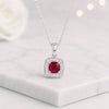 Cushion Cut Ruby Halo Pendant Necklace with Round Diamond Accent