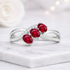 Oval Cut Ruby Three Stone Ring In 14K White Gold